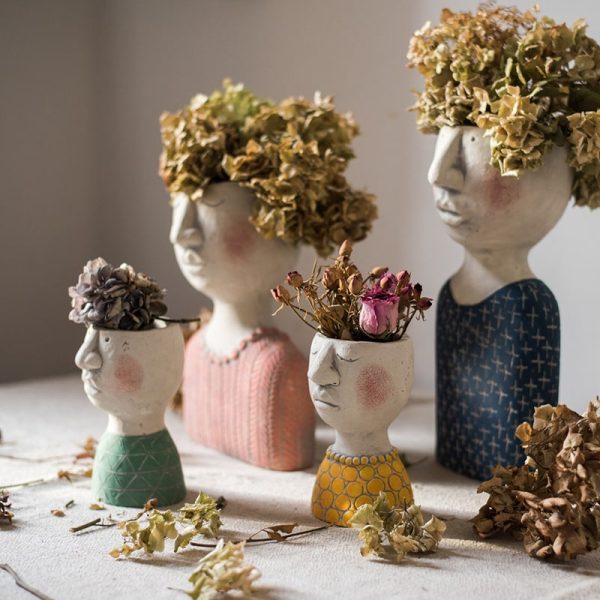 Retro rood Grieks standbeeld hoofd bloempotten